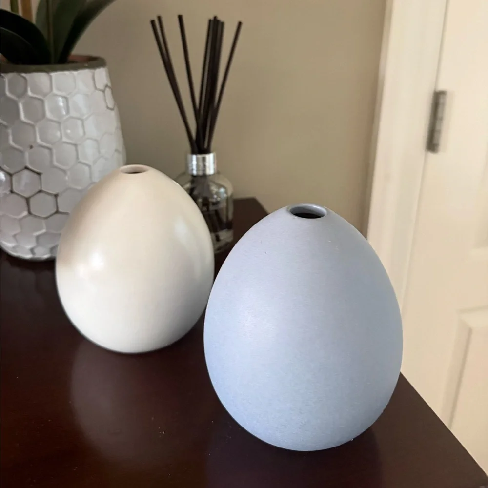 West Elm Light Blue and Ivory ceramic vase set.